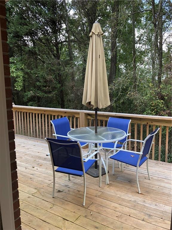 3788 Sandy Ford Road Hickory, NC 28602 - Photo 25 of 30 a view of deck with two chairs and wooden floor