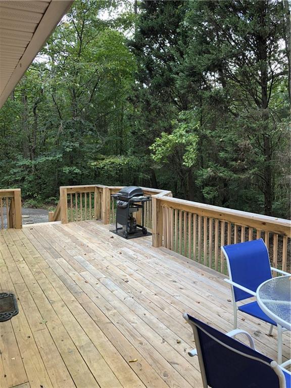 3788 Sandy Ford Road Hickory, NC 28602 - Photo 27 of 30 a balcony with wooden floor and yard in the back