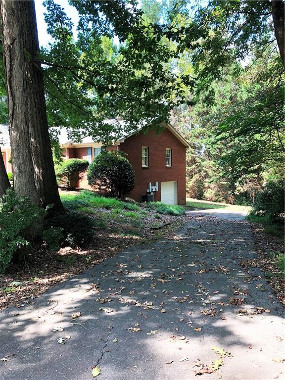 3788 Sandy Ford Road Hickory, NC 28602 - Photo 28 of 30 a front view of a house with a yard