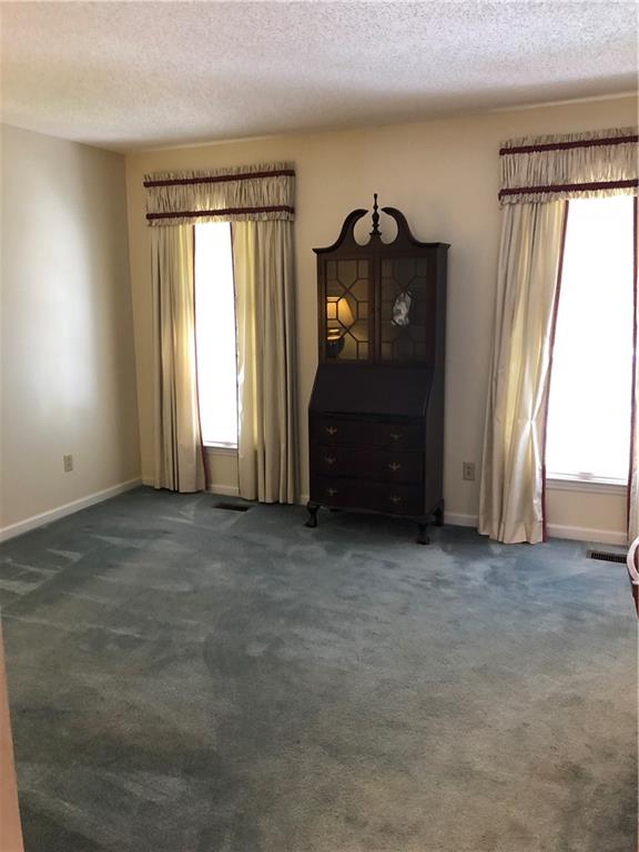 3788 Sandy Ford Road Hickory, NC 28602 - Photo 4 of 30 an empty room with windows and closet