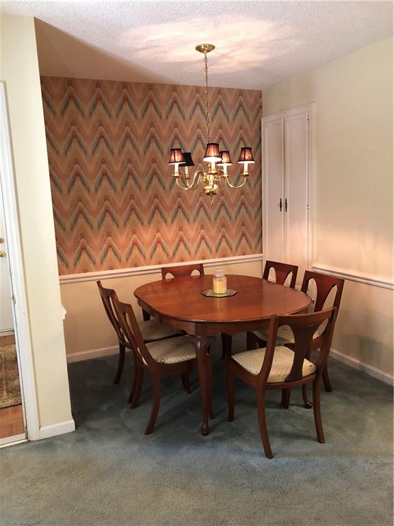 3788 Sandy Ford Road Hickory, NC 28602 - Photo 5 of 30 a view of a table and chairs in a room