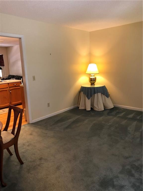3788 Sandy Ford Road Hickory, NC 28602 - Photo 6 of 30 a room with a table and chairs