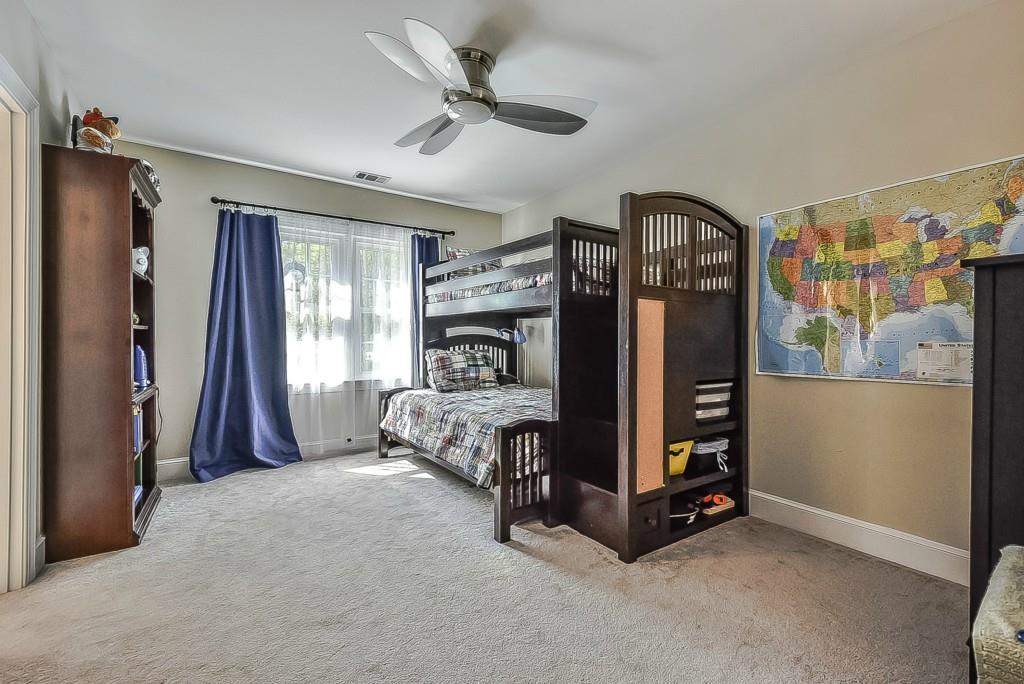 3631 Plantation Road, Unit 15 Charlotte, NC 28270 - Photo 14 of 23 a bed room with a bed and a window