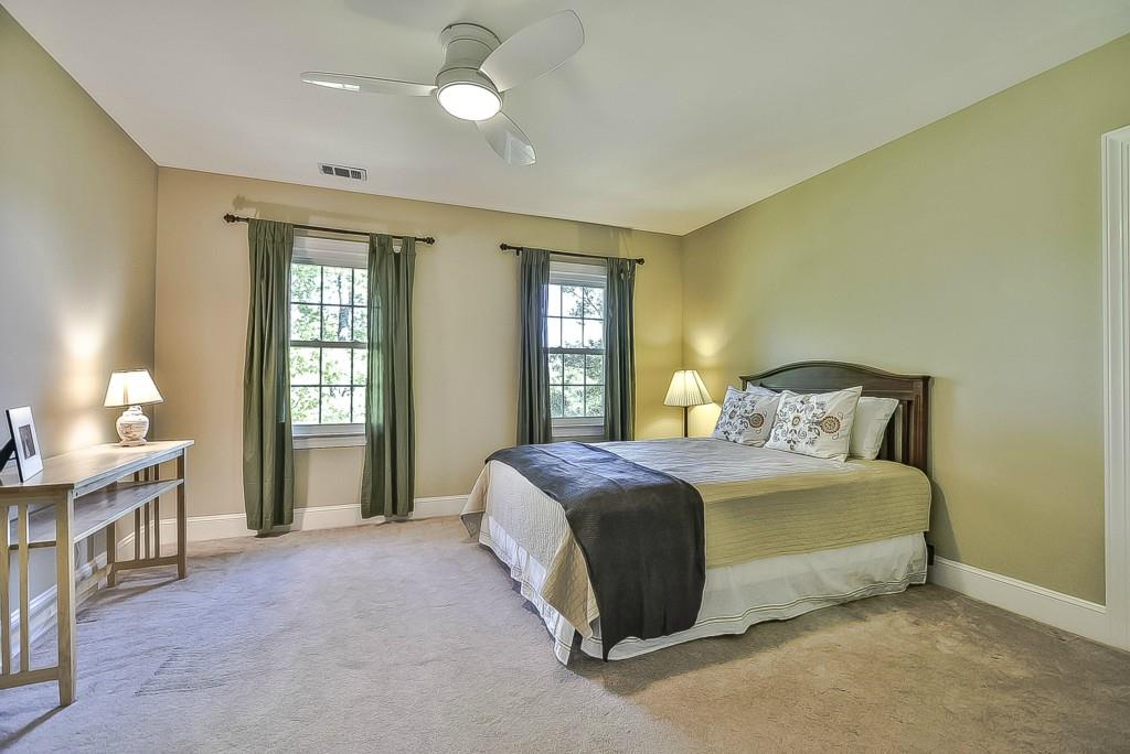 3631 Plantation Road, Unit 15 Charlotte, NC 28270 - Photo 17 of 23 a spacious bedroom with a bed and a window