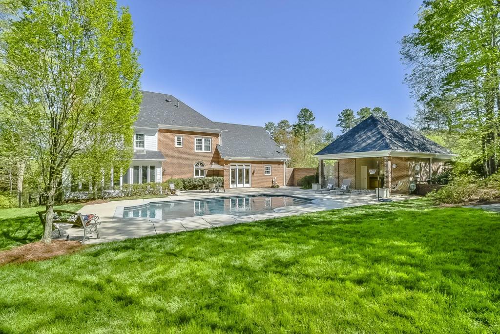 3631 Plantation Road, Unit 15 Charlotte, NC 28270 - Photo 23 of 23 a view of a house with a yard and sitting area