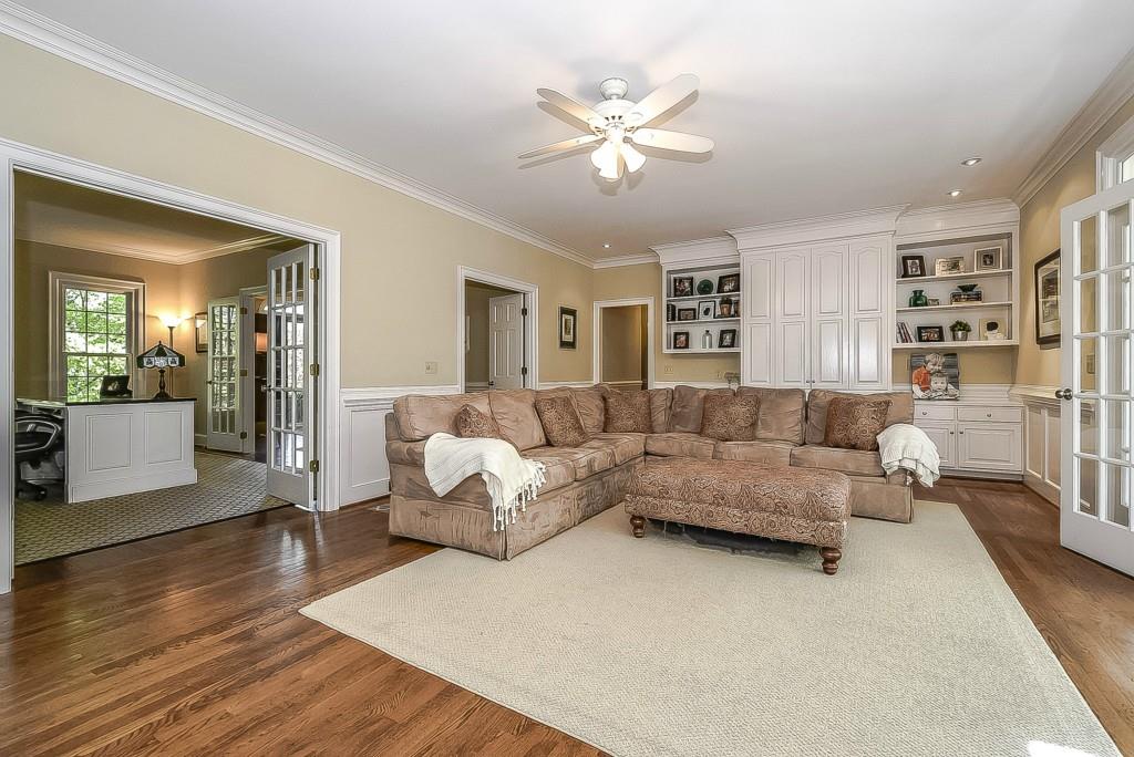 3631 Plantation Road, Unit 15 Charlotte, NC 28270 - Photo 5 of 23 a living room with furniture and a wooden floor