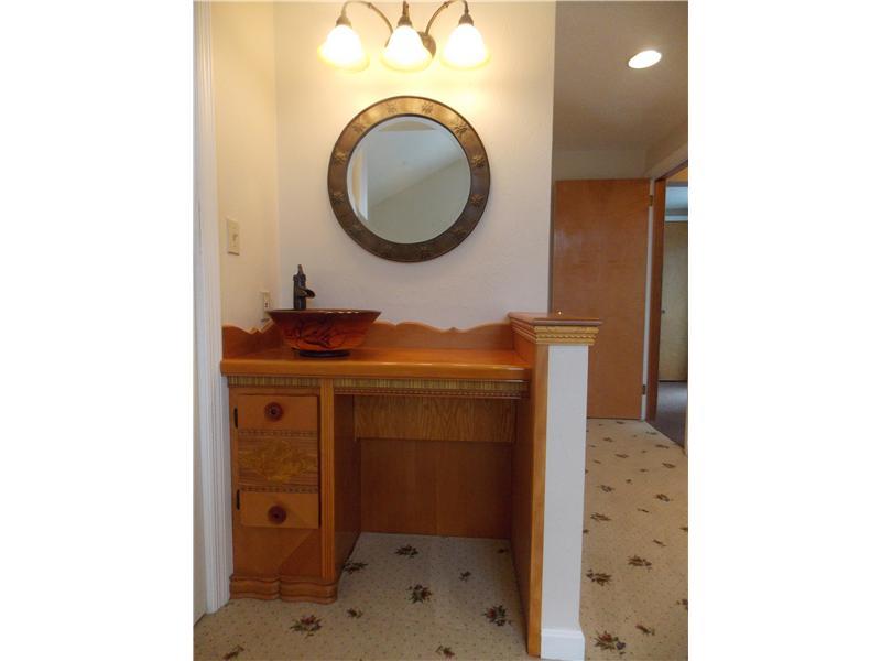 242 Kangaroo Hill Road Lowber, PA 15660 - Photo 14 of 21 Master Bedroom. Can you believe this?! So pretty...and so functional and handy! An antique vanity tucked ina corner with running water...such a great place to put on your makeup!..or shave!