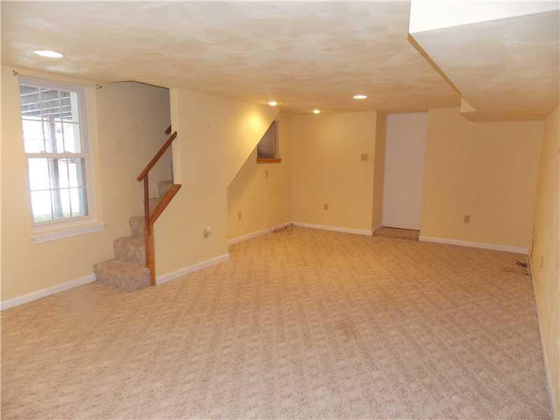 242 Kangaroo Hill Road Lowber, PA 15660 - Photo 16 of 21 Family Room. Room for everyone with this bright, happy family room!