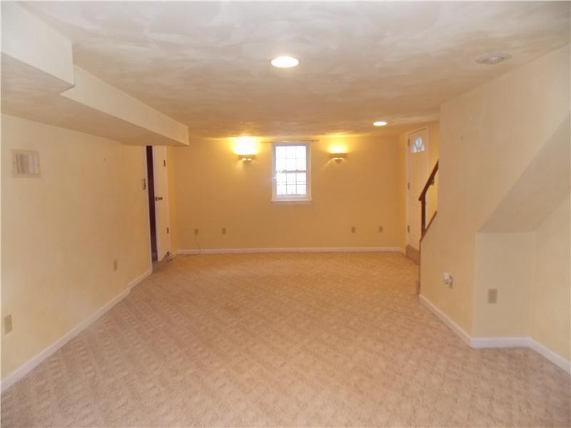 242 Kangaroo Hill Road Lowber, PA 15660 - Photo 17 of 21 Family Room. Recessed lighting, windows, and a door leading to back yard!