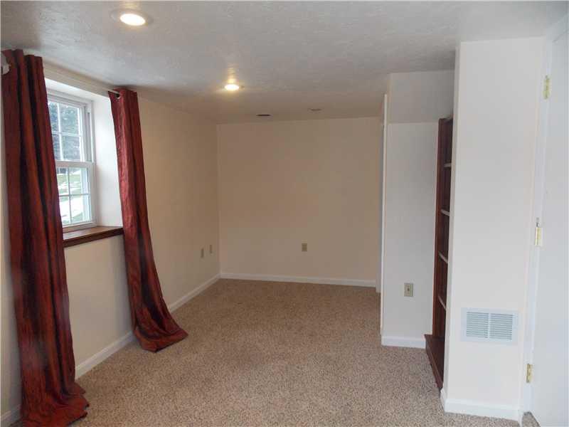 242 Kangaroo Hill Road Lowber, PA 15660 - Photo 18 of 21 Bedroom. Downstairs bedroom....plus there is a full bath right off this bedroom in hall...