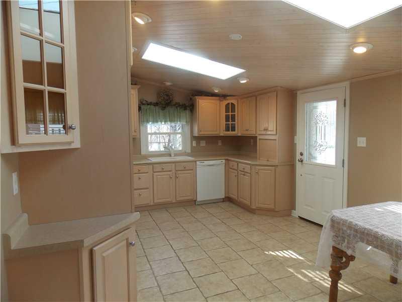 242 Kangaroo Hill Road Lowber, PA 15660 - Photo 4 of 21 Kitchen. Awesome, sunny, spacious and beautiful are just a few of the ways to describe this wonderful eat in kitchen that will please any chef!