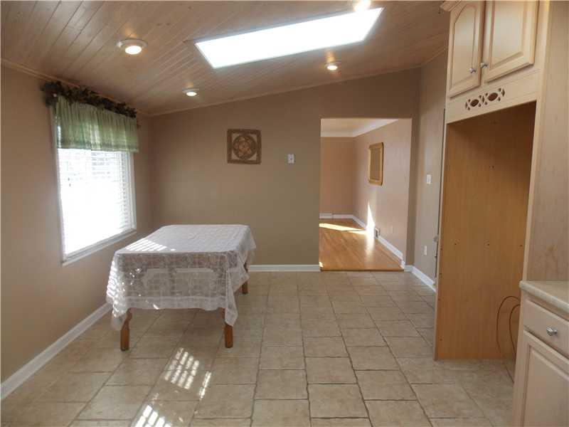 242 Kangaroo Hill Road Lowber, PA 15660 - Photo 7 of 21 Kitchen. Nice eat in area of kitchen...in front a a window...perfect!