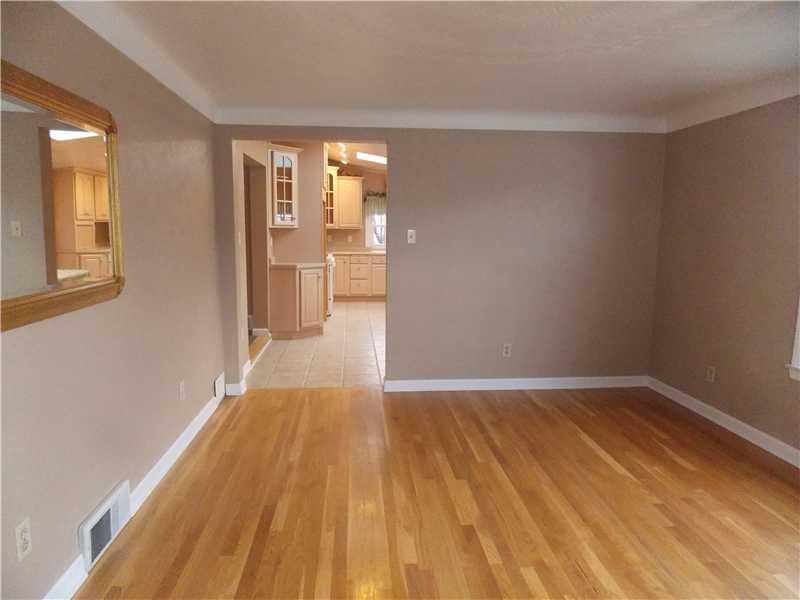 242 Kangaroo Hill Road Lowber, PA 15660 - Photo 9 of 21 Living Room. The living room is right off the kitchen...perfect for entertaining!
