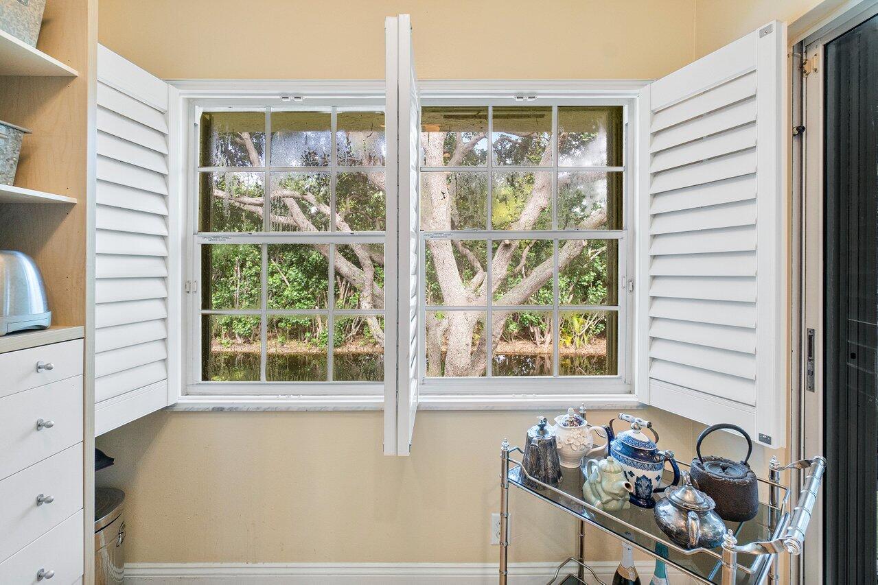 17266 Boca Club Boulevard, Unit 1603 Boca Raton, FL 33487 - Photo 18 of 42 a view of a room that has a bed and a window