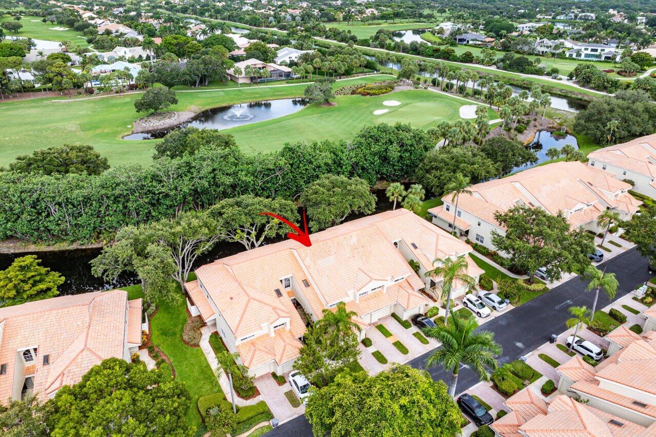 17266 Boca Club Boulevard, Unit 1603 Boca Raton, FL 33487 - Photo 39 of 42 an aerial view of a residential houses with outdoor space and trees all around