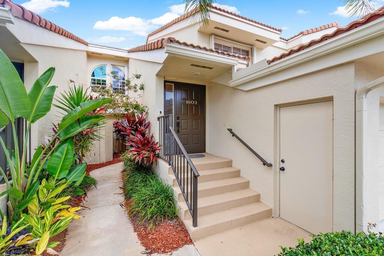 17266 Boca Club Boulevard, Unit 1603 Boca Raton, FL 33487 - Photo 5 of 42 a view of a pathway with a building in front