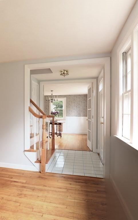 36 Parting Rock Road Duxbury, MA 02332 - Photo 13 of 29 a view of a living room with hardwood floor and a large window