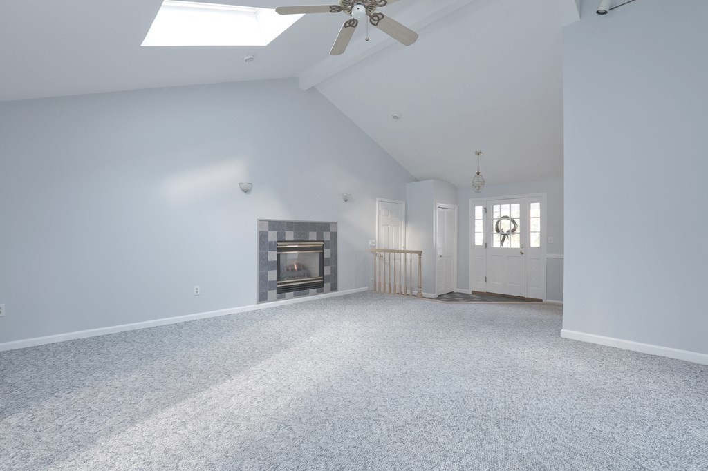 36 Parting Rock Road Duxbury, MA 02332 - Photo 17 of 29 an empty room with windows and fan