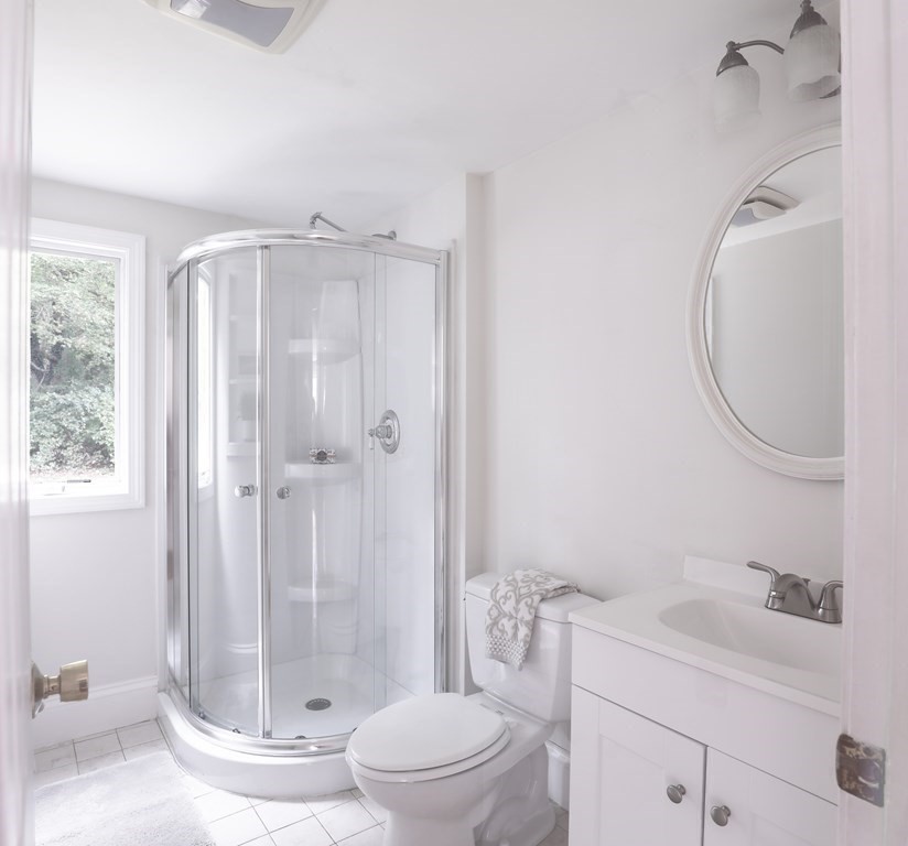 36 Parting Rock Road Duxbury, MA 02332 - Photo 19 of 29 a bathroom with a granite countertop sink toilet and shower