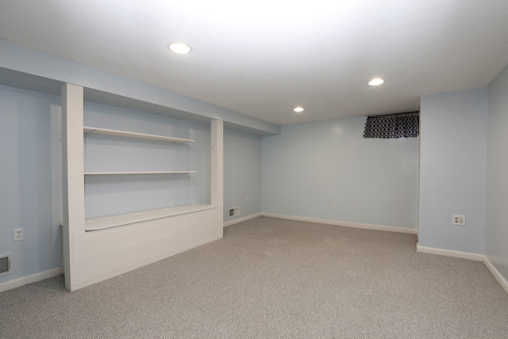 36 Parting Rock Road Duxbury, MA 02332 - Photo 25 of 29 a view of an empty room with a hallway