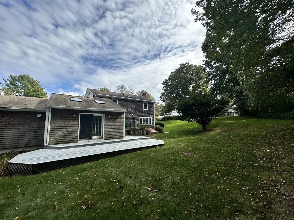 36 Parting Rock Road Duxbury, MA 02332 - Photo 27 of 29 a view of a house with backyard and porch