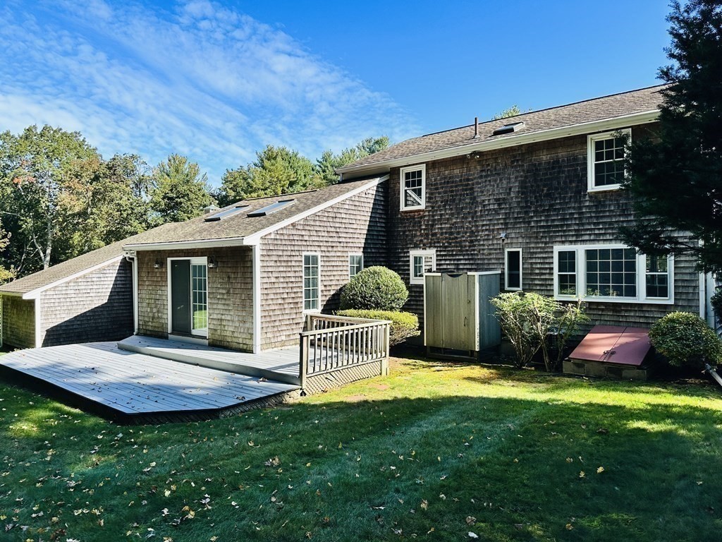 36 Parting Rock Road Duxbury, MA 02332 - Photo 6 of 29 a view of a house with backyard and porch