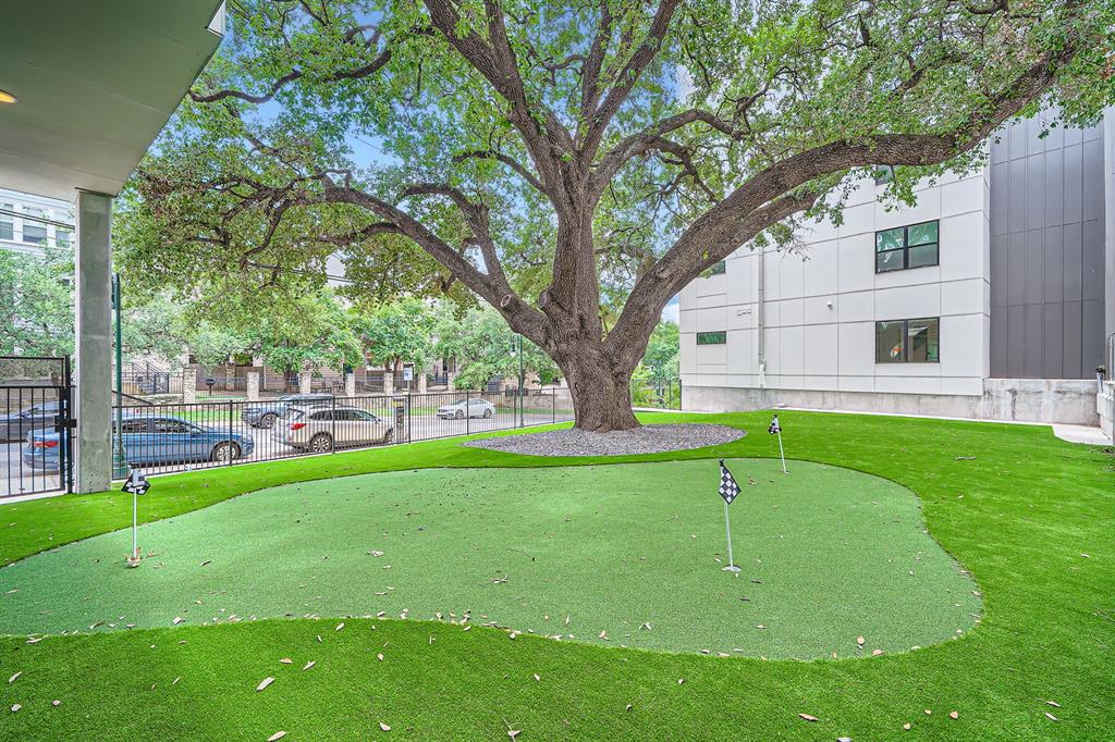 2500 Longview Street, Unit 418 Austin, TX 78705 - Photo 28 of 40 a view of a garden with a slide