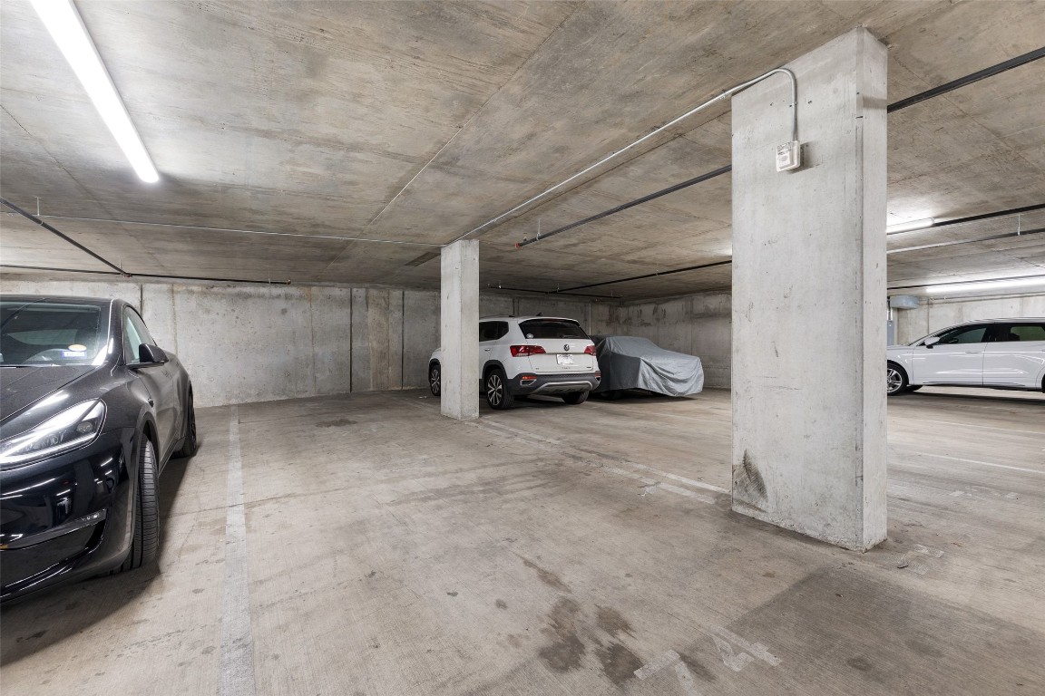 2500 Longview Street, Unit 418 Austin, TX 78705 - Photo 32 of 40 a view of parking garage with cars parked