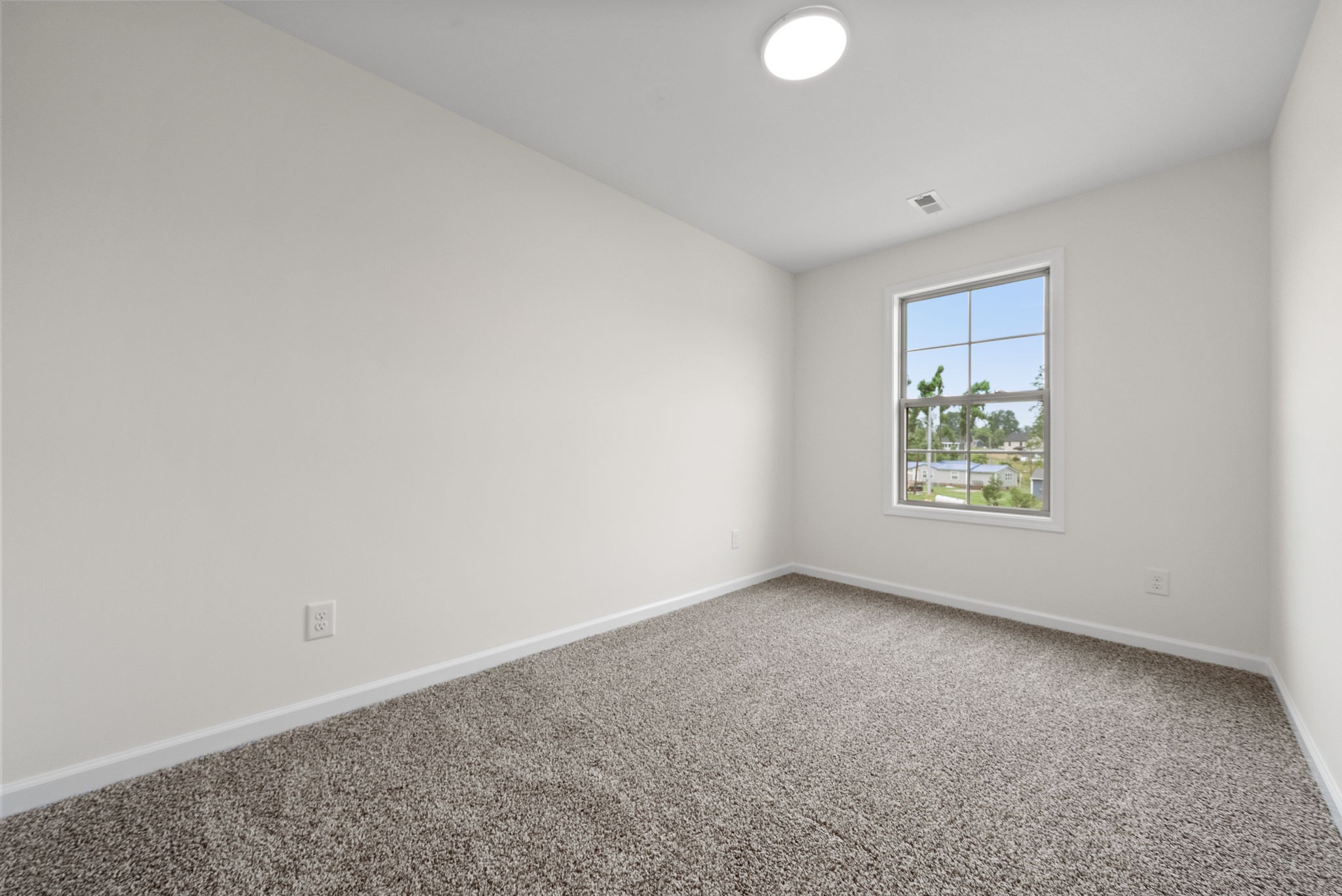 1912 Evans Road Clarksville, TN 37042 - Photo 13 of 32 an empty room with a window