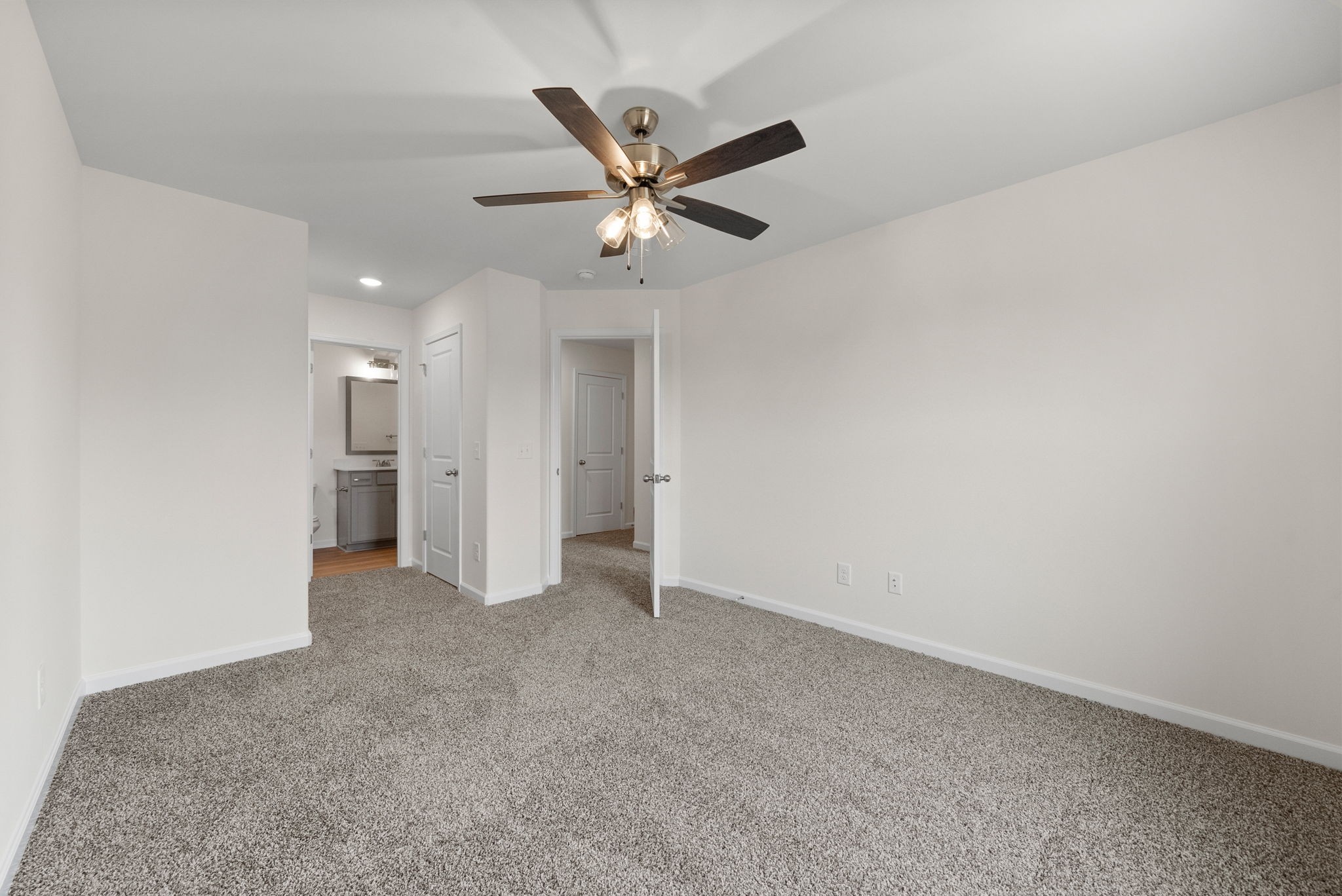 1912 Evans Road Clarksville, TN 37042 - Photo 16 of 32 an empty room with closet and ceiling fan