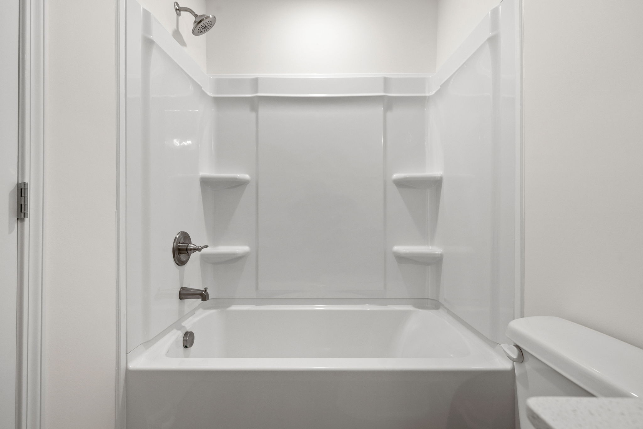 1912 Evans Road Clarksville, TN 37042 - Photo 19 of 32 a bathroom with a bathtub and toilet