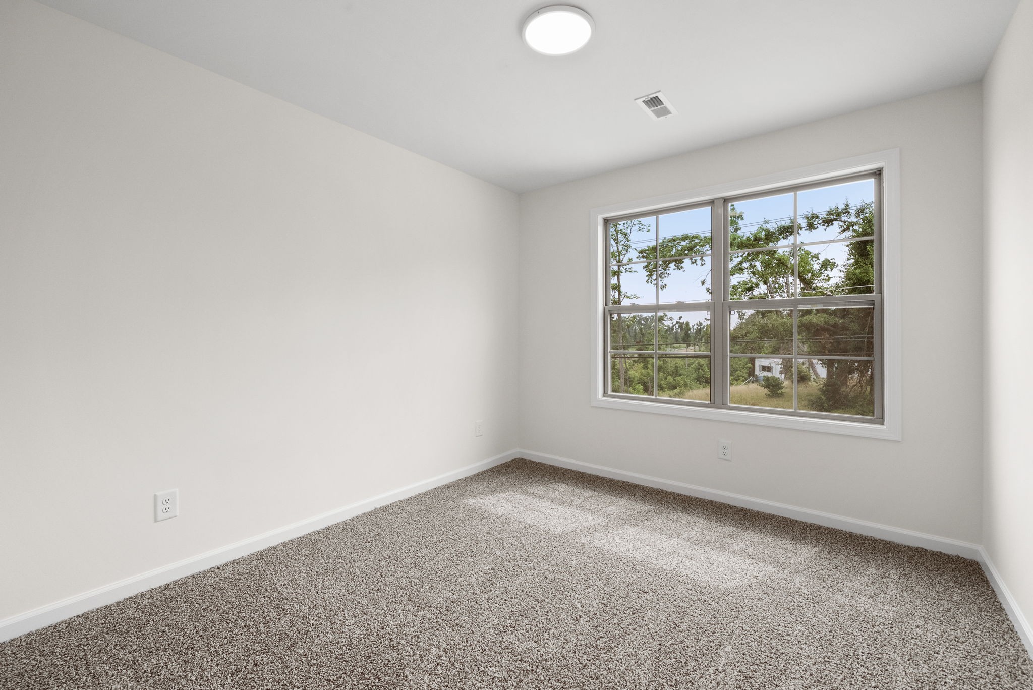 1912 Evans Road Clarksville, TN 37042 - Photo 23 of 32 an empty room with windows