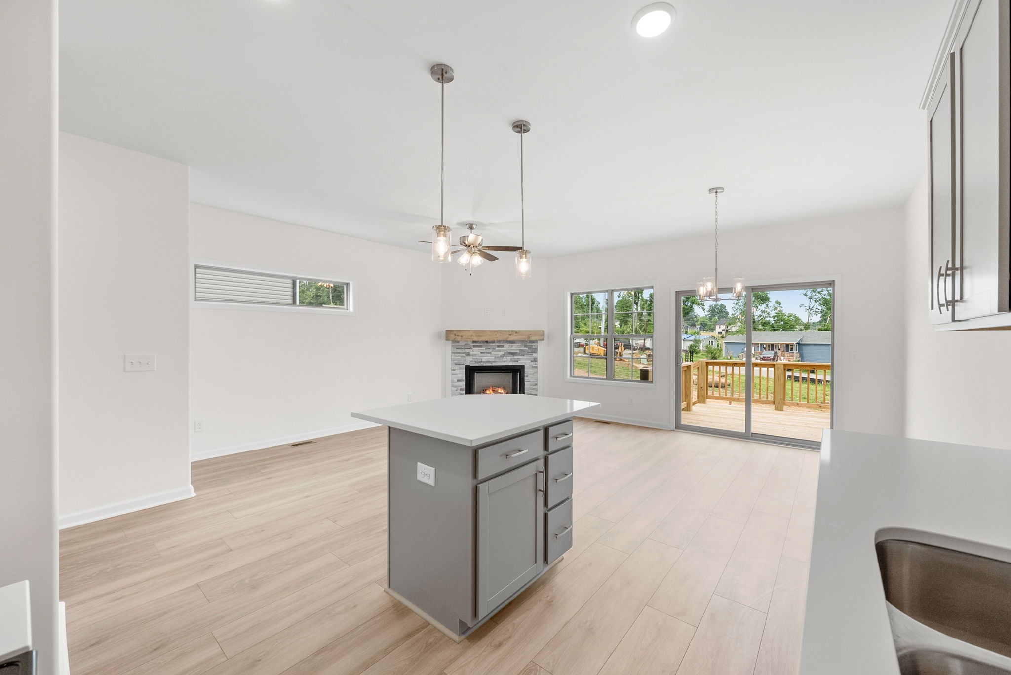 1912 Evans Road Clarksville, TN 37042 - Photo 5 of 32 a kitchen with a refrigerator a sink and dishwasher a oven with wooden floor