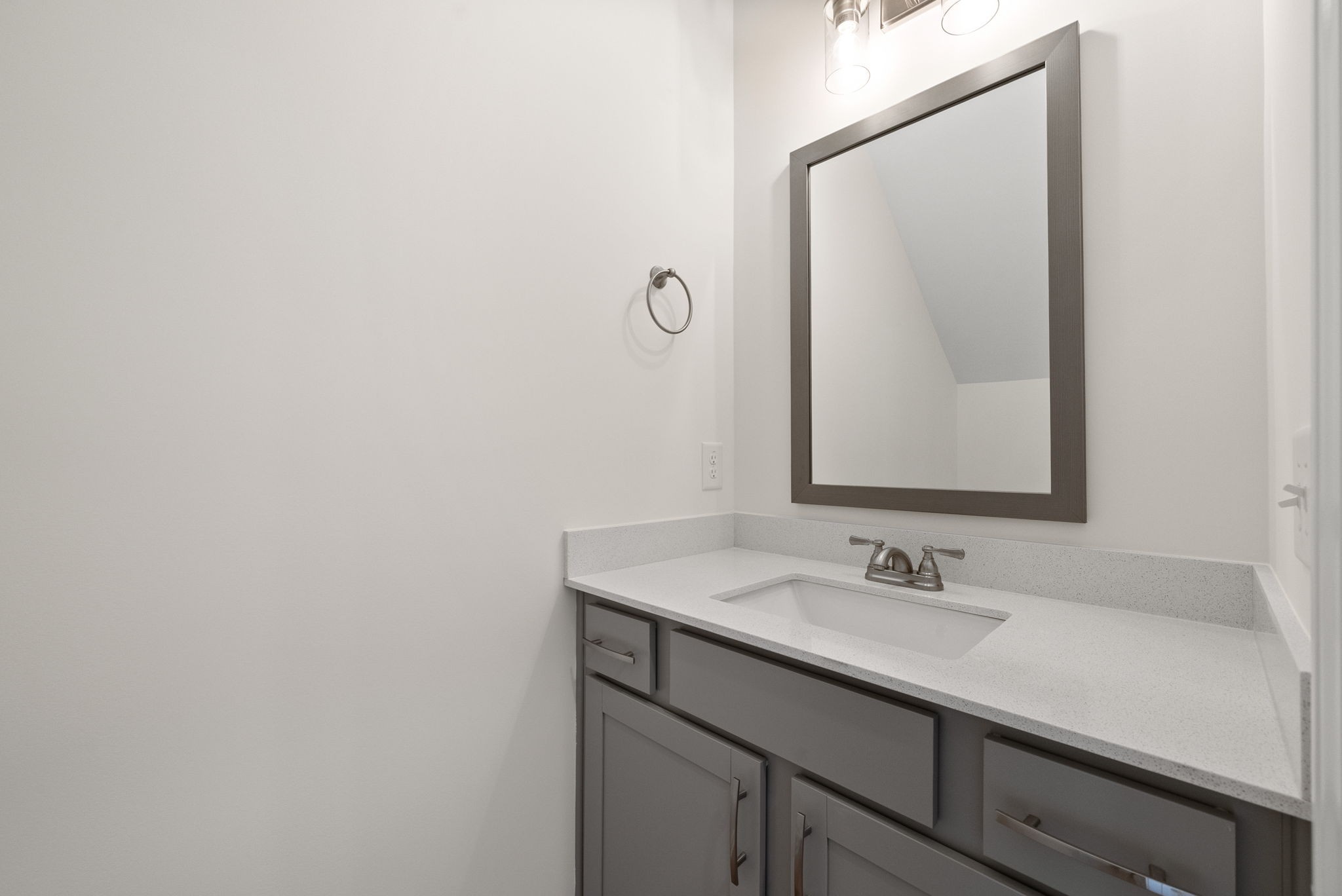 1912 Evans Road Clarksville, TN 37042 - Photo 10 of 32 a bathroom with a sink vanity and mirror