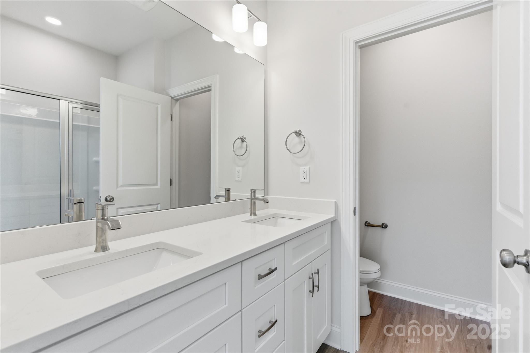 222 1st Street South Fort Mill, SC 29708 - Photo 13 of 23 a bathroom with a sink and a mirror