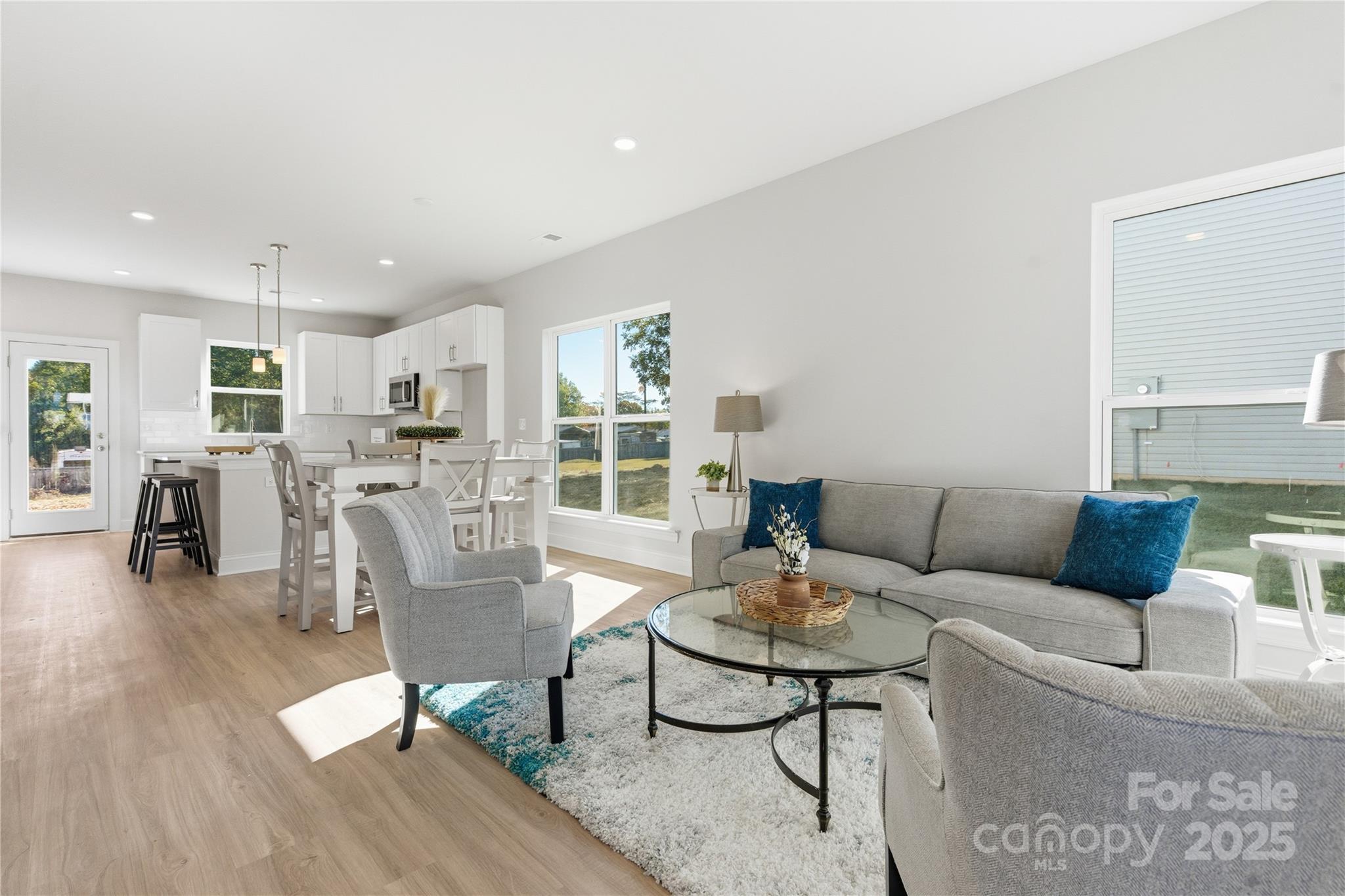 222 1st Street South Fort Mill, SC 29708 - Photo 2 of 23 a living room with furniture and wooden floor
