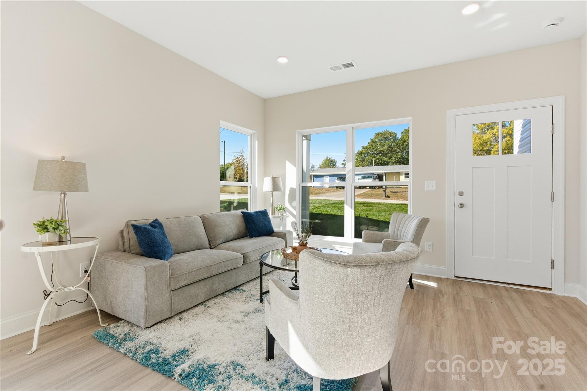 222 1st Street South Fort Mill, SC 29708 - Photo 21 of 23 a living room with furniture and a large window