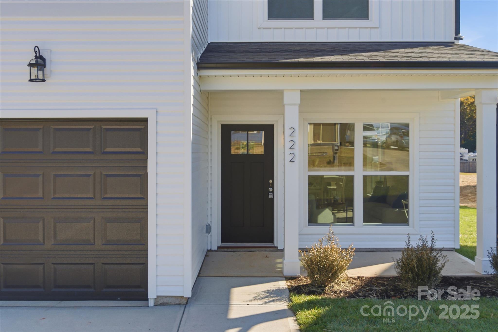 222 1st Street South Fort Mill, SC 29708 - Photo 22 of 23 a front view of a house with a yard