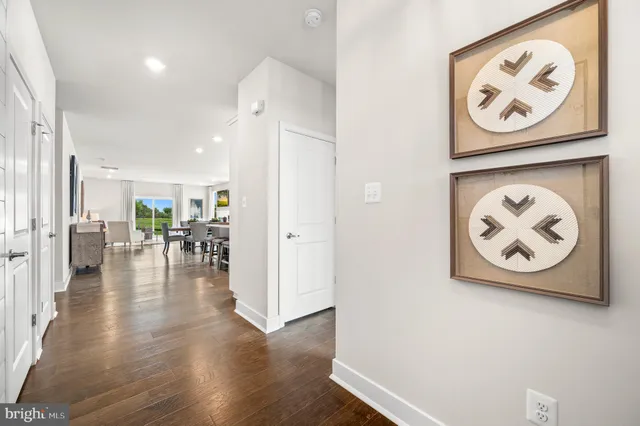 an entryway with wooden floor
