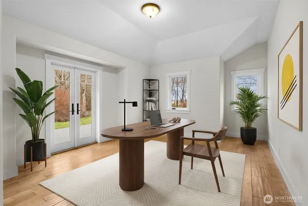 a view of a yard with large trees