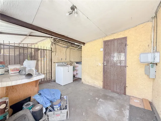 a utility room with large windows