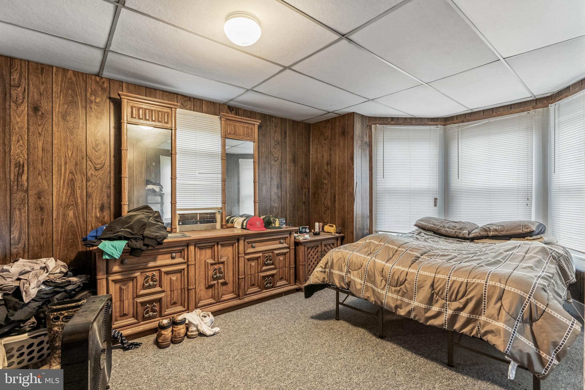 237 South 3rd Street Millville, NJ 08332 - Photo 14 of 23 a bedroom with a bed and large windows