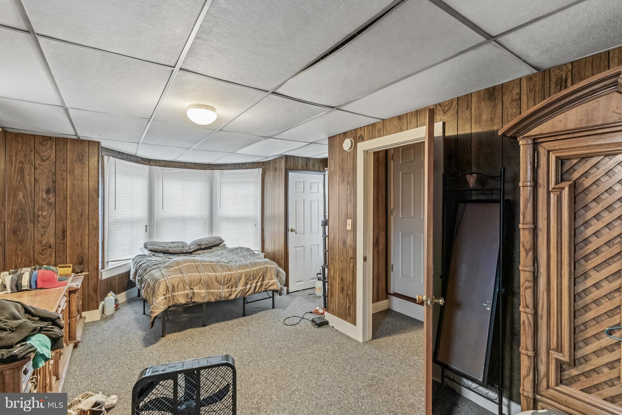 237 South 3rd Street Millville, NJ 08332 - Photo 15 of 23 a bedroom with bed and a window