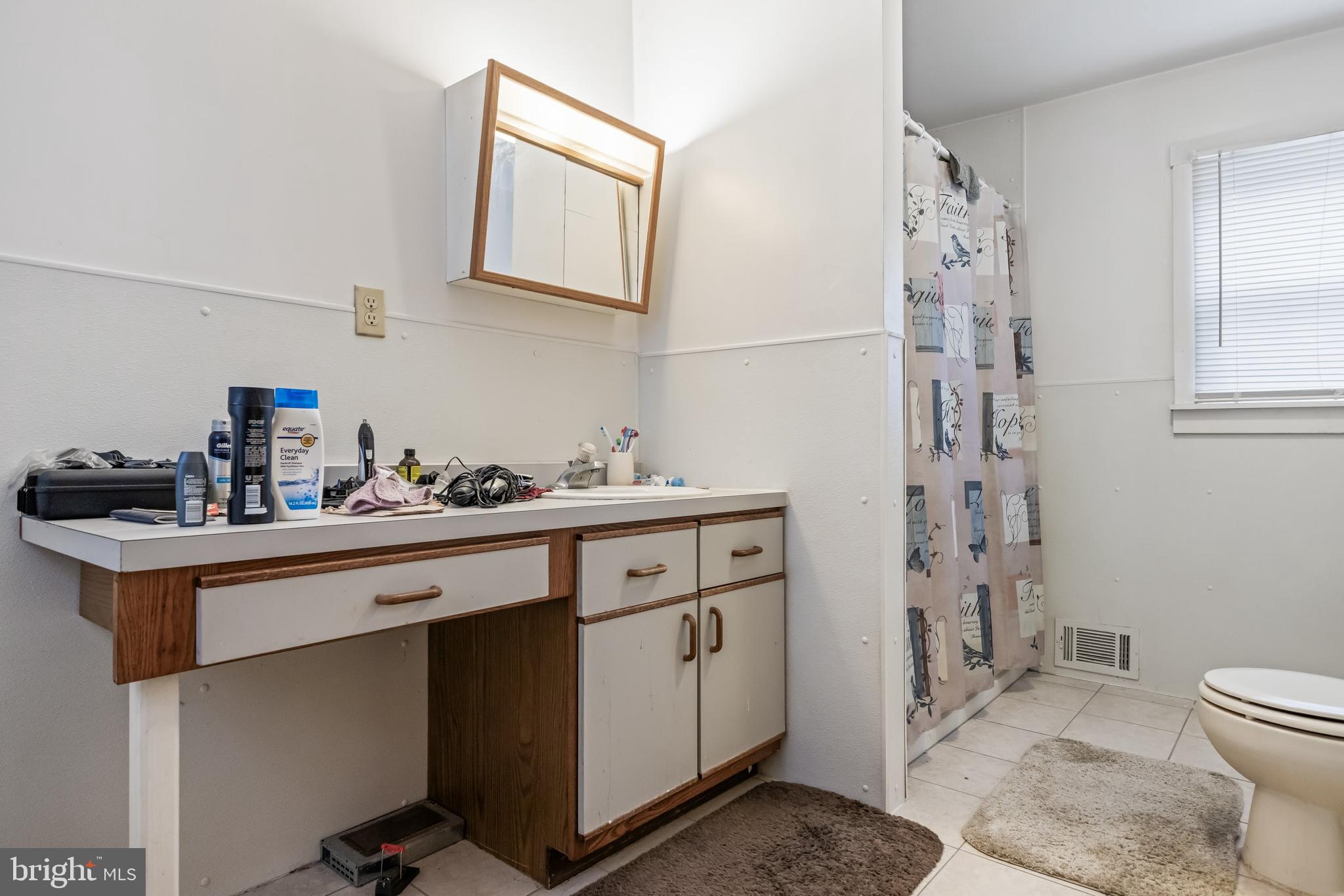 237 South 3rd Street Millville, NJ 08332 - Photo 18 of 23 a kitchen with stainless steel appliances a sink and cabinets