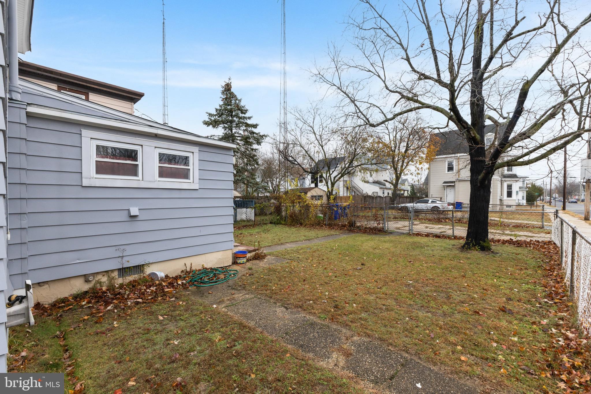 237 South 3rd Street Millville, NJ 08332 - Photo 23 of 23 a backyard of a house with large trees