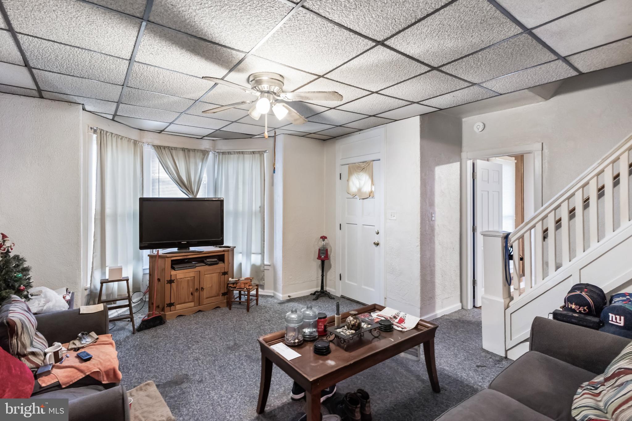 237 South 3rd Street Millville, NJ 08332 - Photo 7 of 23 a living room with furniture and a flat screen tv