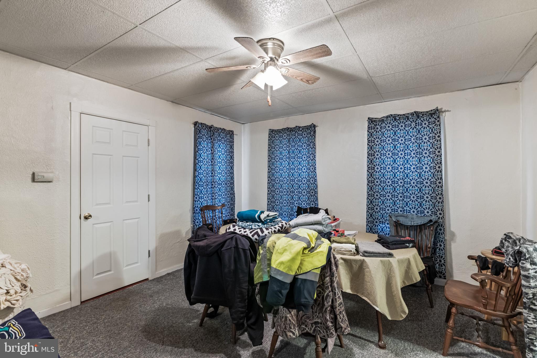 237 South 3rd Street Millville, NJ 08332 - Photo 8 of 23 a bed room with furniture and chandelier