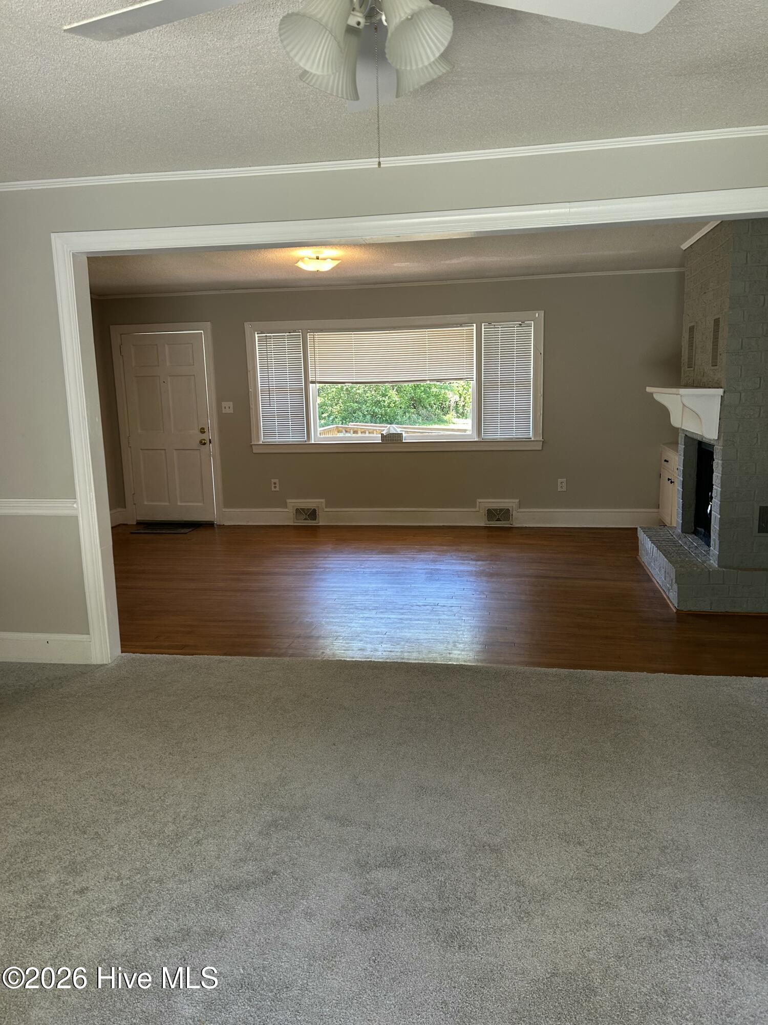 4083 North Pitt Street Ayden, NC 28513 - Photo 14 of 18 At front door looking into living room