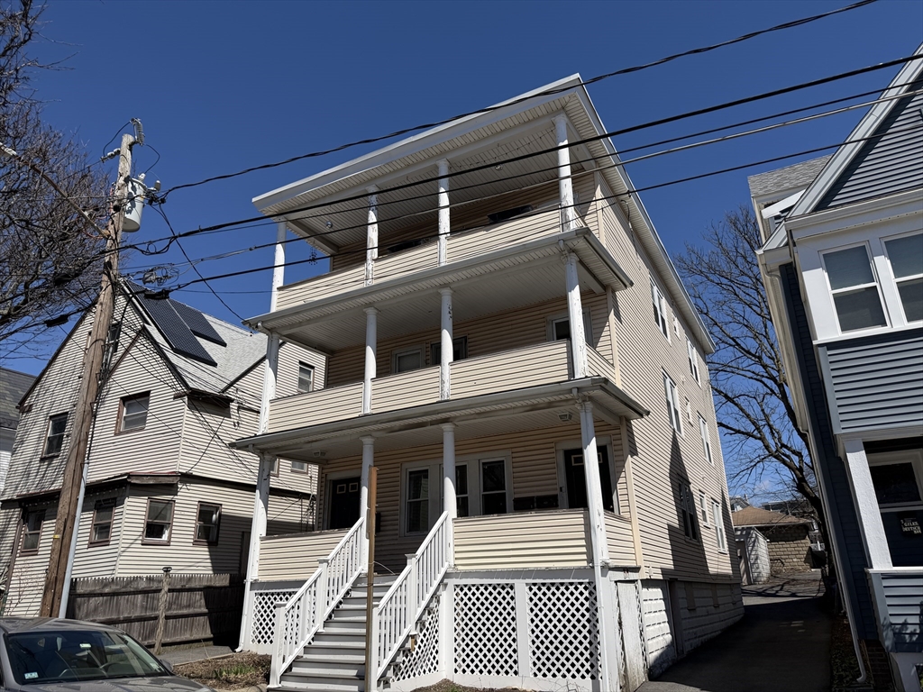 33-35 Sewall Street Somerville, MA 02145 - Photo 1 of 15 a roof view of a building