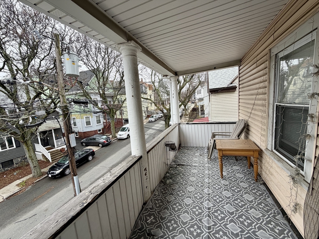 33-35 Sewall Street Somerville, MA 02145 - Photo 13 of 15 a view of a balcony with chairs